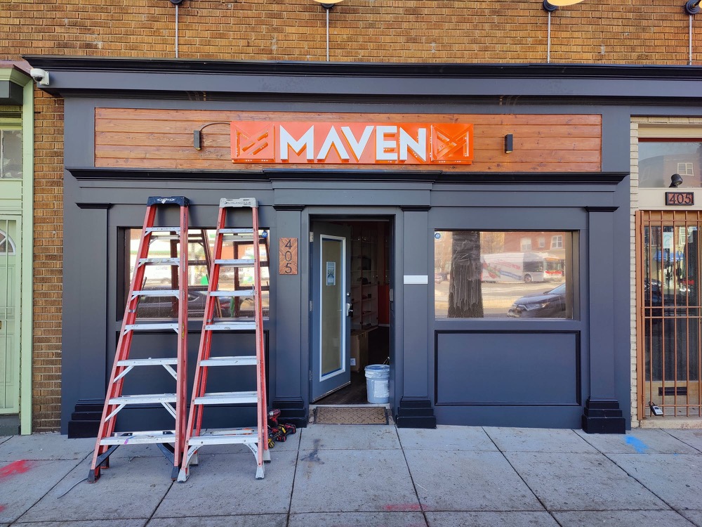 Storefront sign on brick building